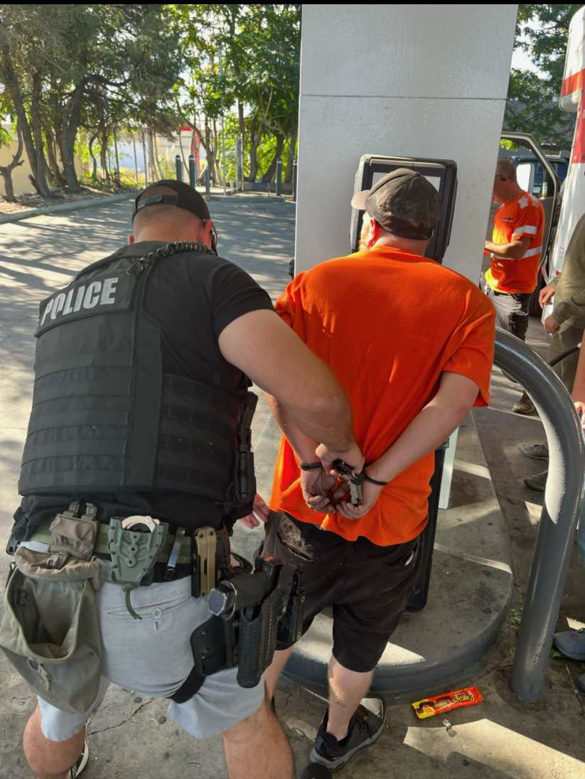 Austin Halderman being arrested by Sheriff's Deputy and US Marshals